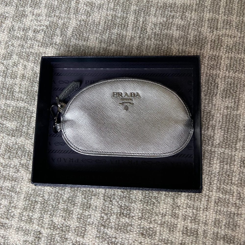 Sleek and Timeless Silver Prada Change Purse